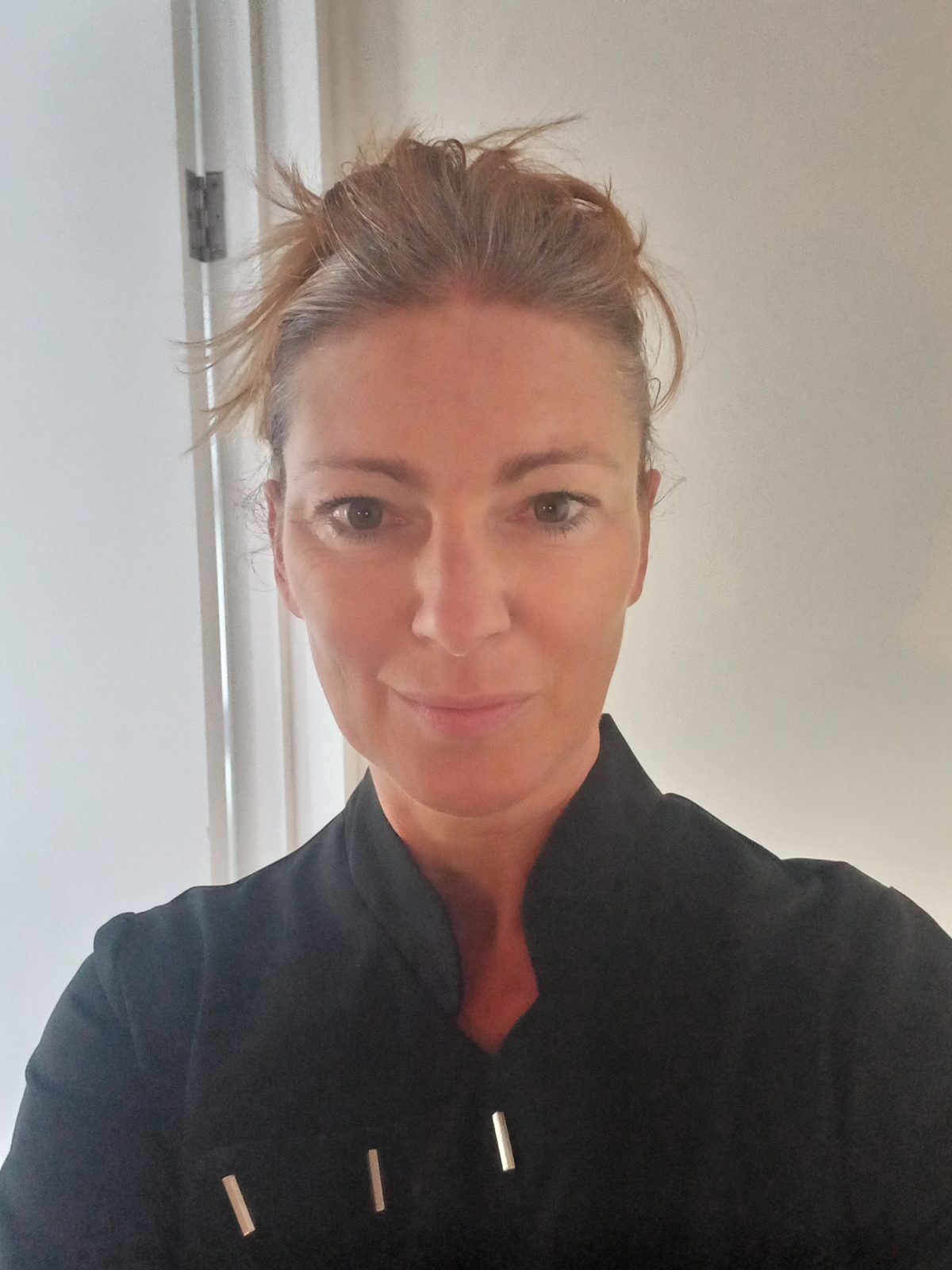 Dawn Carrington in her therapist tunic